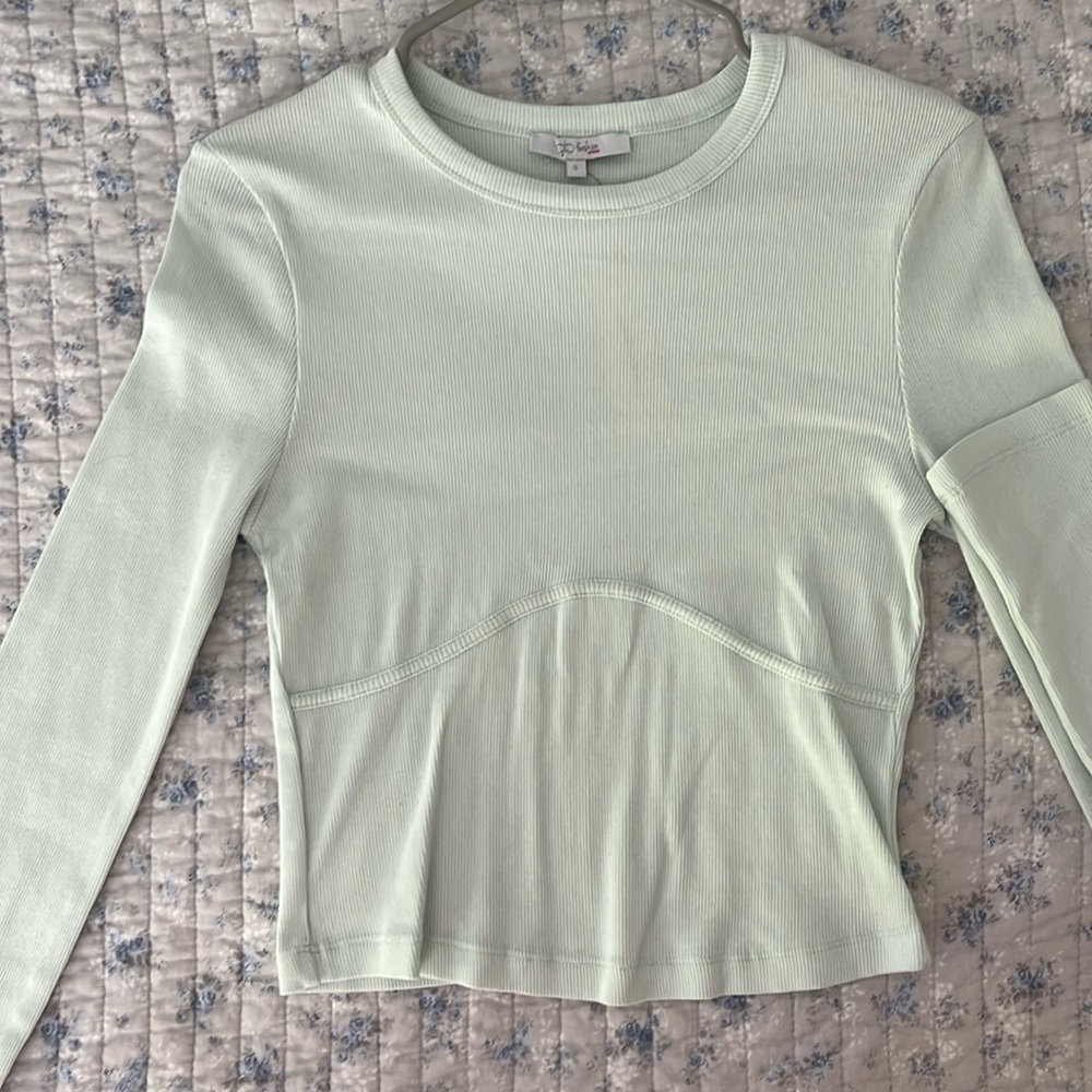 Mint green long sleeve corset top.